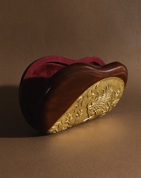 Decorative sheesham wooden body sang bag with gold embossed design and handworked brass panel